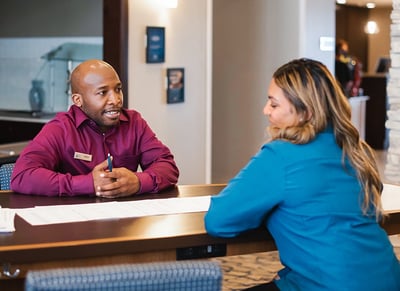 hotel staff members talking