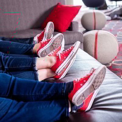 people wearing red shoes